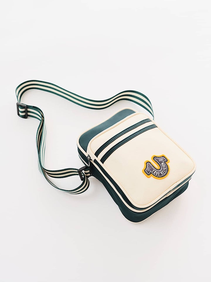 TRUE RELIGION COLLEGIATE SLING BAG