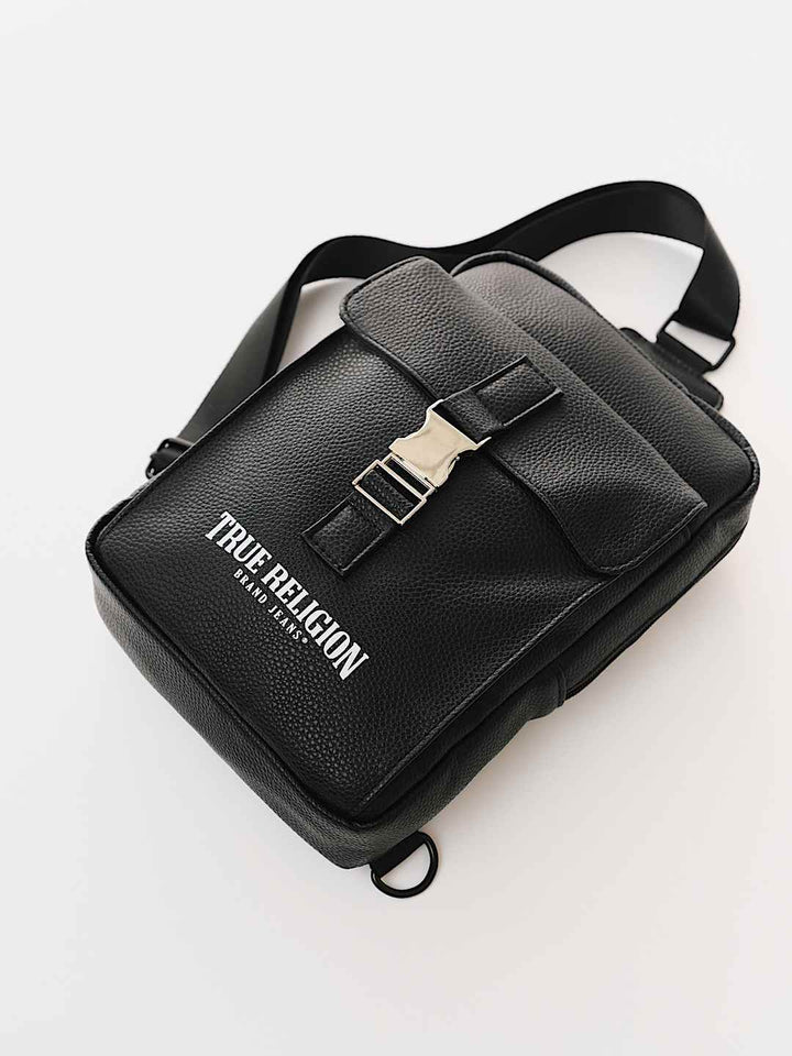 TRUE RELIGION METAL CLASP LOGO SLING BAG
