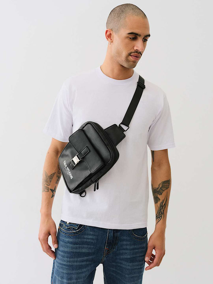 TRUE RELIGION METAL CLASP LOGO SLING BAG